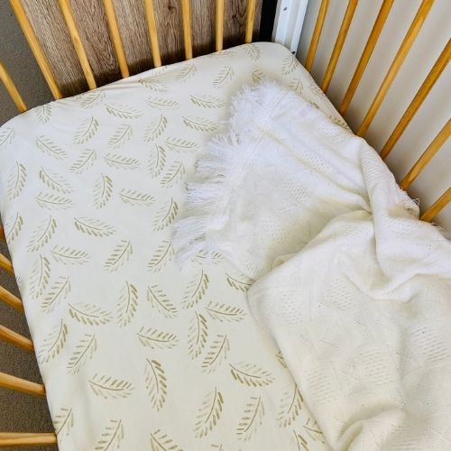 Jersey Cotton Cot Sheet - Gold Fern