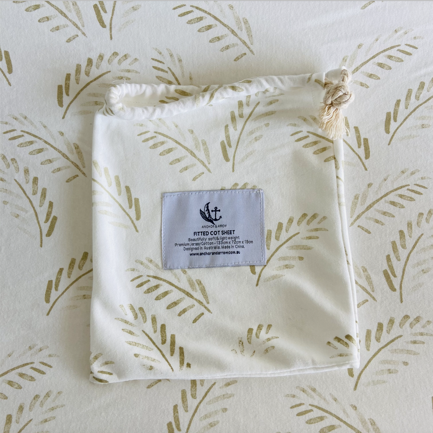 Jersey Cotton Cot Sheet - Gold Fern