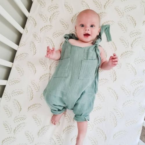 Jersey Cotton Cot Sheet - Gold Fern